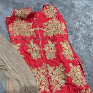 Red and gold party were pant suit